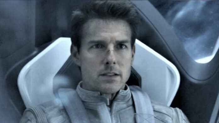 Tom Cruise performing a spacewalk during filming aboard the International Space Station