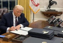 After Venezuela Action, Trump Signals Possible Tough Moves Against Mexico, Cuba, and Colombia US President Donald Trump speaking at a podium with flags behind him