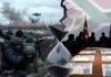 Ukraine-Russia War Enters Stalemate in 2026: Peace Talks Buzz Amid Drone Strikes and Western Fatigue Ukraine-Russia war 2026 frontline: Soldiers in Donbas trenches amid drone strikes, with overlaid peace talk symbols from Vatican and G20 summits.