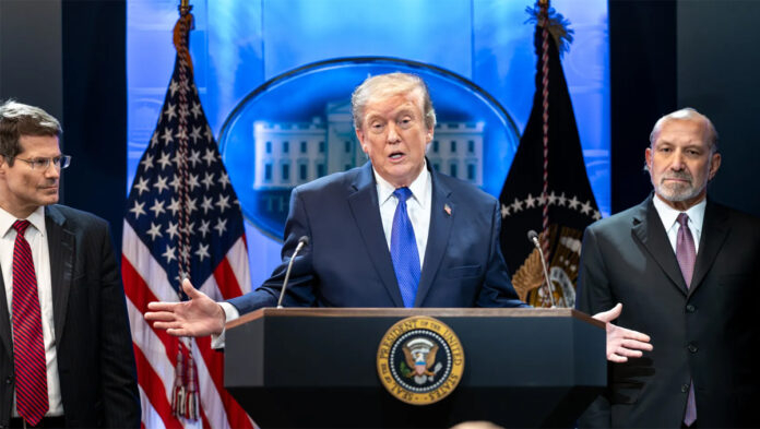 President Donald Trump speaking about tariffs and American trade policy as shipping containers sit at a US port