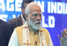 PM Modi Highlights Inclusive AI Vision at India AI Impact Summit 2026 in New Delhi Prime Minister Narendra Modi addressing delegates at India AI Impact Summit 2026