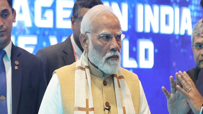 Prime Minister Narendra Modi addressing delegates at India AI Impact Summit 2026