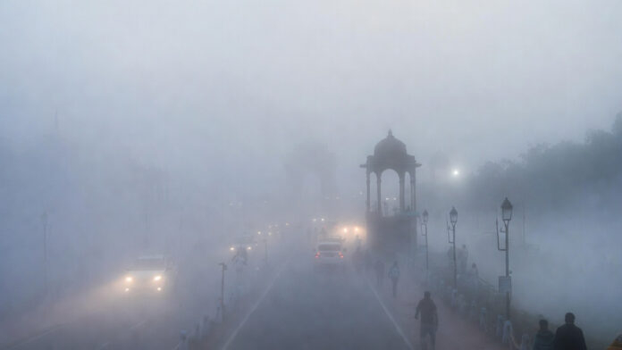 Dense morning fog reduces visibility over Delhi roads and landmarks on a cold February day in 2026