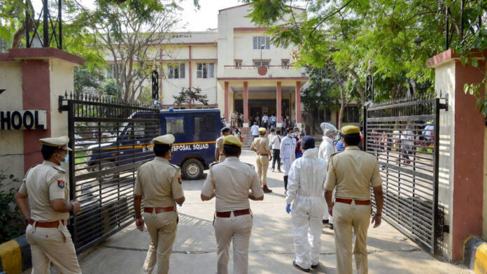 Delhi police and bomb squad outside school after bomb threat email