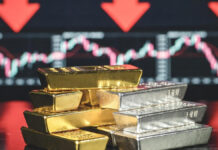 Gold and Silver Prices Slip in Domestic, Global Markets Amid Geopolitical Uncertainty Close-up of gold and silver bullion bars reflecting recent price decline in global markets