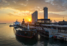 India’s Saudi Oil Imports May Hit 6-Year High as Russian Purchases Decline Oil tanker loading crude at export terminal representing global oil trade