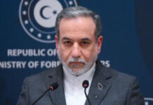 Iran Warns It Is Ready to Respond if Attacked Amid Ongoing U.S. Nuclear Talks Iranian Foreign Minister Abbas Araghchi speaking during a press conference about nuclear talks