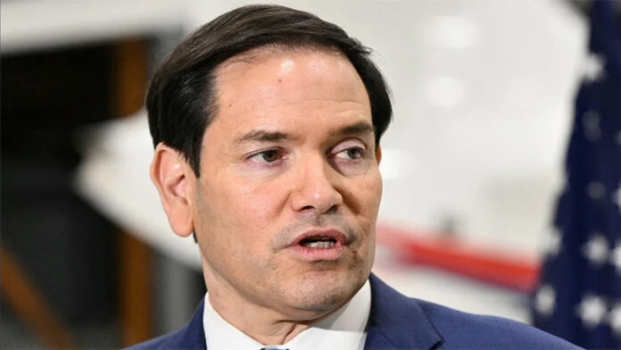 Marco Rubio speaking at a diplomatic press conference in Budapest
