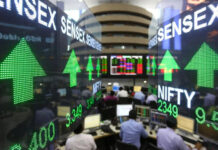 Sensex Dips 40 Points, Nifty Edges Higher in Volatile Trade as IT Losses Offset Auto, PSU Bank Gains BSE Sensex and NSE Nifty closing values on February 11, 2026, showing flat market performance