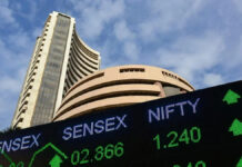 Stock Market Opens Slightly Higher: Sensex Up 10 Points, Nifty Holds Above 25,700 Stock market trading screen showing Sensex and Nifty opening in green