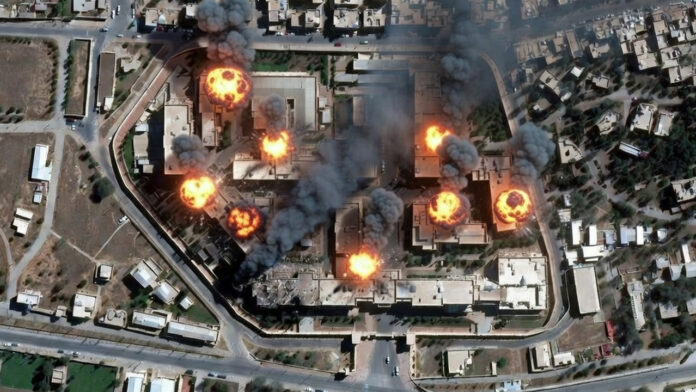 Satellite image showing damage and smoke near secure compound in Tehran amid Israel-US airstrikes