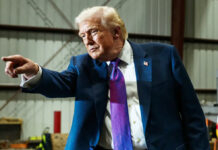 U.S. Proposes 126% Tariff on Indian Solar Imports; Trade Move Could Disrupt Global Supply Chain Donald Trump speaking about U.S. tariffs as solar panels symbolize proposed 126% duties on Indian imports.