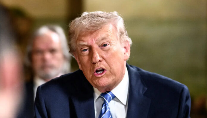 Donald Trump speaking about global tariffs at a press briefing