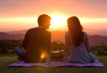 Valentine’s Day 2026 “Extra Special” Ideas Go Viral — Creative Surprises & Unique Date Plans Couples Are Loving Couple enjoying romantic sunset picnic on Valentine’s Day