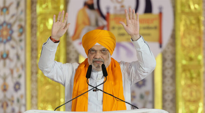 Union Minister for Home Affairs and Cooperation, Amit Shah addressing the gathered congregation