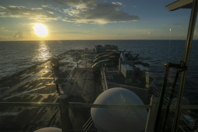 USS Tripoli amphibious assault ship with fighter jets deployed in Middle East waters