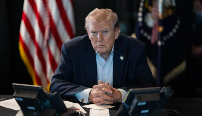 U.S. President Donald Trump speaking at the White House about Iran military warning during Middle East conflict