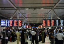 Airfares Skyrocket Amid Middle East Crisis: Dubai–India Tickets Touch ₹1 Lakh as Flights Face Massive Disruptions Passengers waiting at Dubai International Airport as Middle East crisis causes flight cancellations and ticket price surge