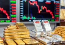 Gold and Silver Prices Crash After Holi: Gold Falls ₹7,600, Silver Plunges ₹27,700 in Delhi Bullion Market Gold and silver bars displayed in a jewelry market as bullion prices fall sharply in Delhi after Holi