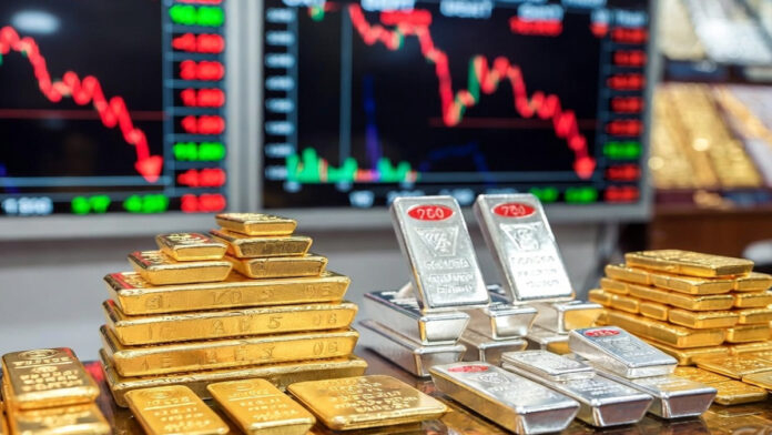 Gold and silver bars displayed in a jewelry market as bullion prices fall sharply in Delhi after Holi