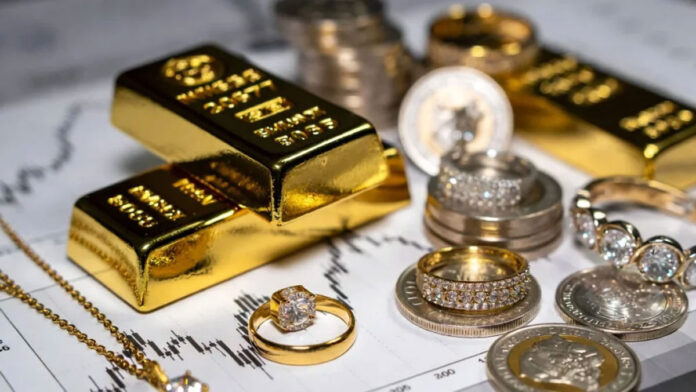 Gold bars and silver coins stacked with rising price chart indicating surge in bullion rates