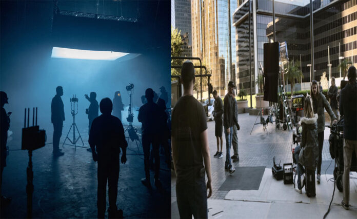 Empty Hollywood film set with idle crew and equipment reflecting production slowdown and job losses