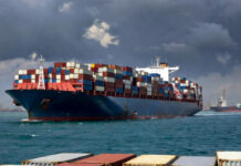 Gulf War Fallout: India’s Exports Stall as Shipping Firms Add $2,000–$4,000 Emergency Surcharge Container ships in Gulf waters amid rising shipping surcharge impact on India exports