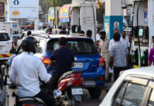 Petrol Prices Surge ₹5/Litre in India: Private Fuel Retailer Raises Rates, Diesel Also Costlier Amid Supply Concerns Petrol pump in India showing increased fuel prices with customers refueling vehicles