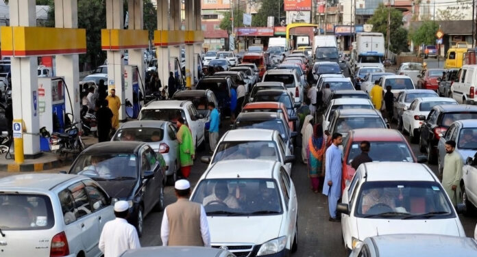Long queues at petrol stations in Pakistan during severe fuel shortage and oil lockdown measures.