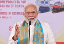 PM Modi Launches Major Projects in Assam, Transfers ₹18,645 Crore to Farmers Under PM-Kisan Prime Minister Narendra Modi addressing a public gathering during a development projects launch event in Guwahati, Assam.