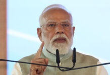 PM Modi Targets TMC at Kolkata Rally, Says ‘Change Is Inevitable in Bengal’ as ₹18,680 Crore Projects Launched Prime Minister Narendra Modi addressing a large rally at Brigade Parade Ground in Kolkata
