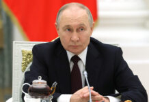 Putin’s Bold Pivot: Russia to Sell Oil at Premium Prices, Ending Discounts for India Amid Global Energy Squeeze President Vladimir Putin overseeing Russian energy strategy meeting in Moscow March 2026 with charts showing Urals crude premium over Brent and Middle East conflict map