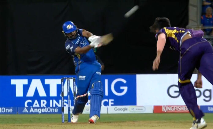Rohit Sharma playing a powerful shot during MI vs KKR IPL 2026 match at Wankhede Stadium