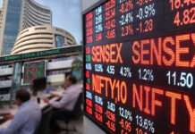 Sensex Crashes 1,470 Points, Nifty Falls Below 23,200 as Market Cap Wipes Out ₹10 Lakh Crore Electronic display board showing Sensex and Nifty falling sharply during a stock market trading session in India.