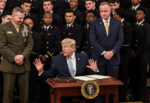 Trump Signals Shift on Iran War, Points to Defense Chief Hegseth as Early Advocate Donald Trump speaking in Memphis highlighting Pete Hegseth role in Iran military decision