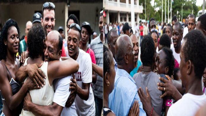 Emotional reunion of Cuban prisoners with families after release showing hugs and tears