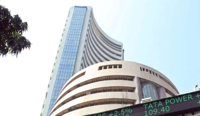Bombay Stock Exchange building with rising stock market data showing Sensex rally