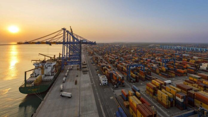 Adani Ports cargo terminal with containers and ships showing strong financial growth in Q4 FY26