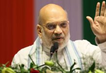 Amit Shah Targets Mamata Banerjee in Darjeeling Rally, Says ‘Time to Remove Didi’ as Bengal Poll Battle Heats Up Amit Shah addressing a large BJP rally in Darjeeling with crowd and party flags