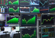 Asian Markets Rally; Nikkei, Kospi Lead Gains Asian stock markets trading screens showing Nikkei Kospi Hang Seng gains
