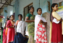 High Voter Turnout in Assam, Kerala, Puducherry Polls Voters standing in long queues during Assembly Elections 2026 in India