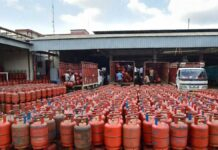 India Cracks Down on Dual Gas Connections: LPG Users with PNG Must Surrender Cylinders Amid Supply Crunch Indian household kitchen with LPG cylinder and PNG pipeline highlighting new government gas rules