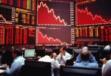 Indian Stock Market Tumbles as Sensex Slides 583 Points, Nifty Falls Below 24,000 Amid Global Tensions Indian stock market crash with falling Sensex and Nifty displayed on trading screens
