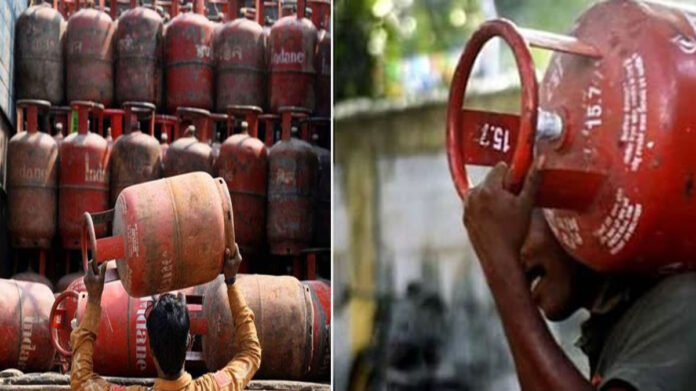LPG gas cylinders stacked outside a distribution agency during supply shortage in India