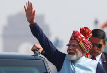 PM Modi Targets Congress in Assam, Predicts Record Defeat Prime Minister Narendra Modi addressing an election rally in Barpeta Assam
