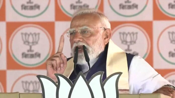 Prime Minister Narendra Modi addressing a large rally in Bongaon West Bengal during election campaign
