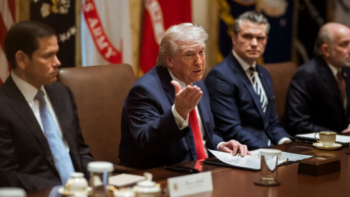 Donald Trump addressing media amid cabinet reshuffle discussions