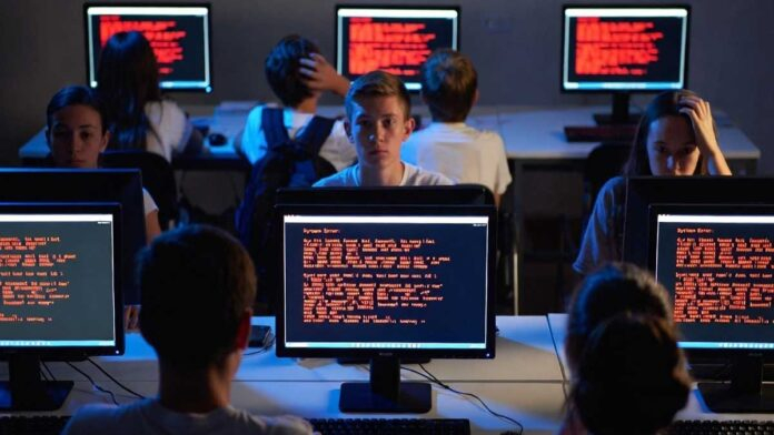 Students facing Canvas platform outage during global cyberattack with ransom message on screen