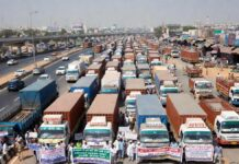 Delhi-NCR Faces Transport Disruption as Truckers Begin Three-Day Strike Over Green Tax and BS-4 Ban Commercial trucks parked during Delhi-NCR transport strike over green tax and BS-4 vehicle restrictions