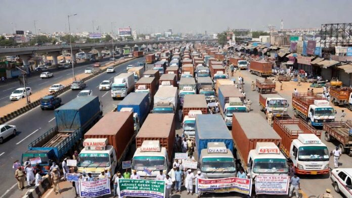 Commercial trucks parked during Delhi-NCR transport strike over green tax and BS-4 vehicle restrictions